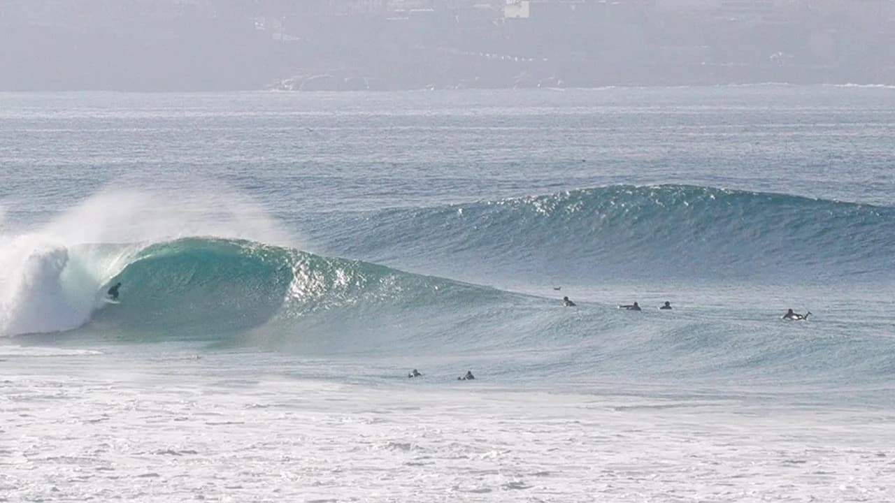 Crowded lineup at a popular surf break