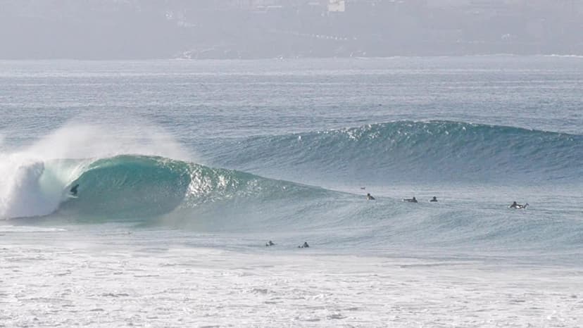 Crowded lineup at a popular surf break